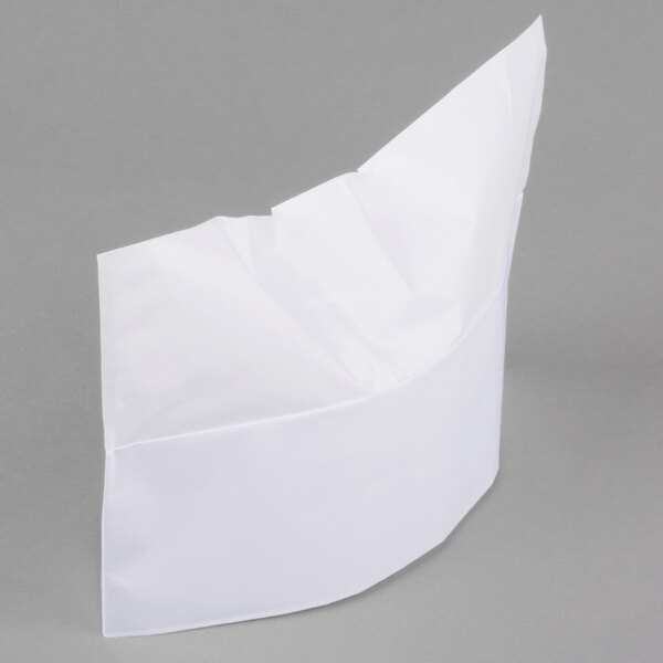 A white Royal Paper overseas cap with a curved edge.