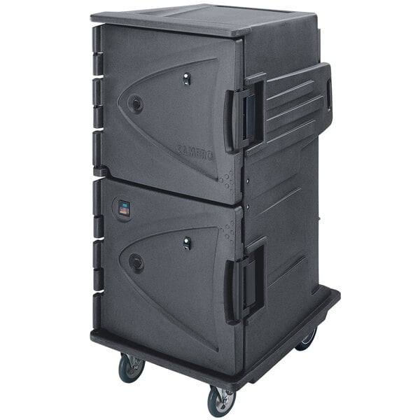 A black plastic food holding cabinet on wheels with a door.