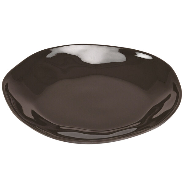 A black Cal-Mil melamine plate with a shiny rim.