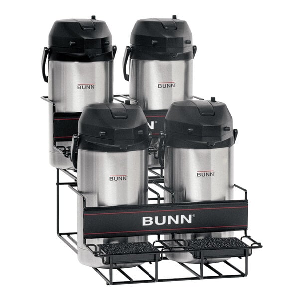 A Bunn Universal Airpot Rack holding four coffee containers.