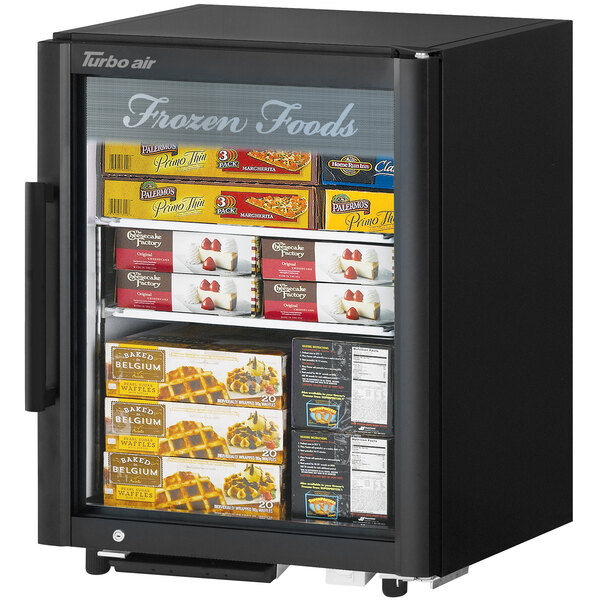 A Turbo Air black countertop freezer with frozen foods inside.
