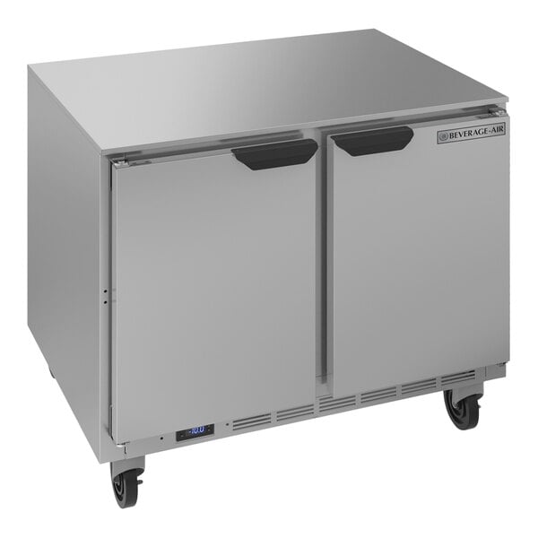 A silver Beverage-Air undercounter freezer with two doors.