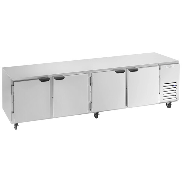 A stainless steel Beverage-Air undercounter refrigerator with three doors.