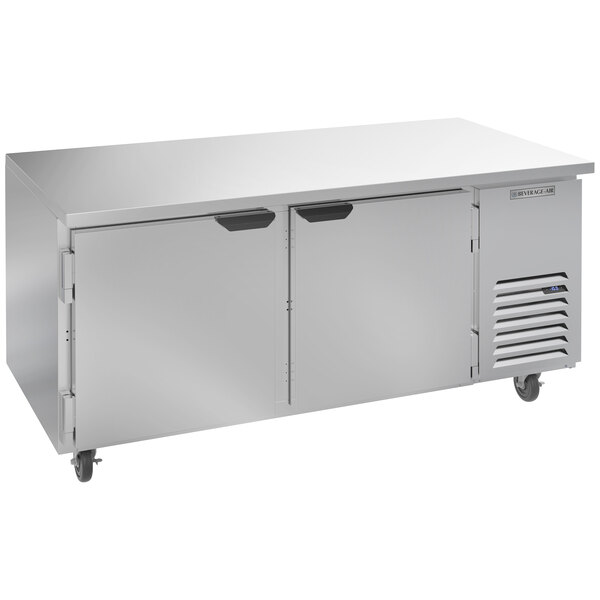 A stainless steel Beverage-Air undercounter freezer with two doors and two drawers.