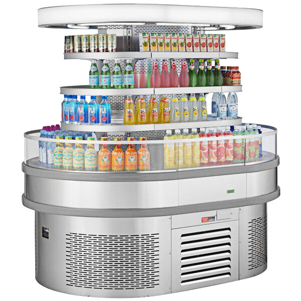 A Turbo Air stainless steel oval island display case with drinks on it.