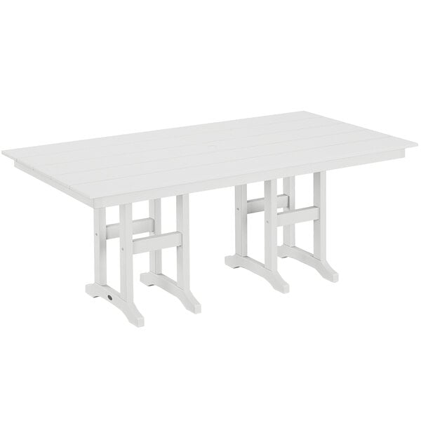 A white POLYWOOD rectangular dining table with legs.