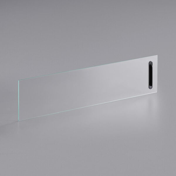 A rectangular glass door with a black handle.