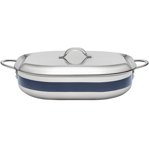 A silver stainless steel Bon Chef French oven with blue handles and a lid.