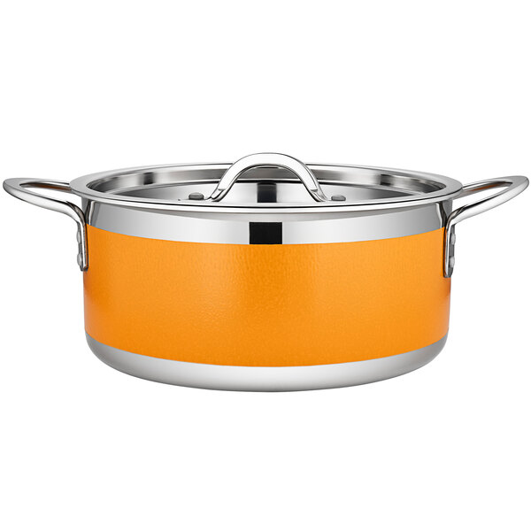 A Bon Chef stainless steel sauce pot with an orange lid.