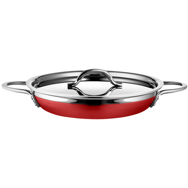 A red stainless steel Bon Chef saute pan with a lid.