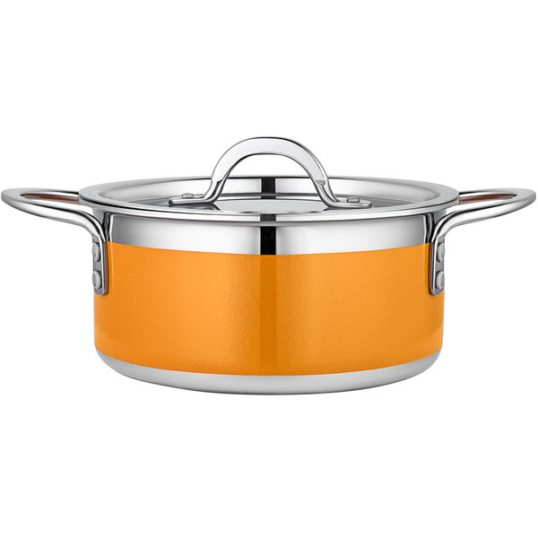 An orange Bon Chef stainless steel sauce pot with lid.