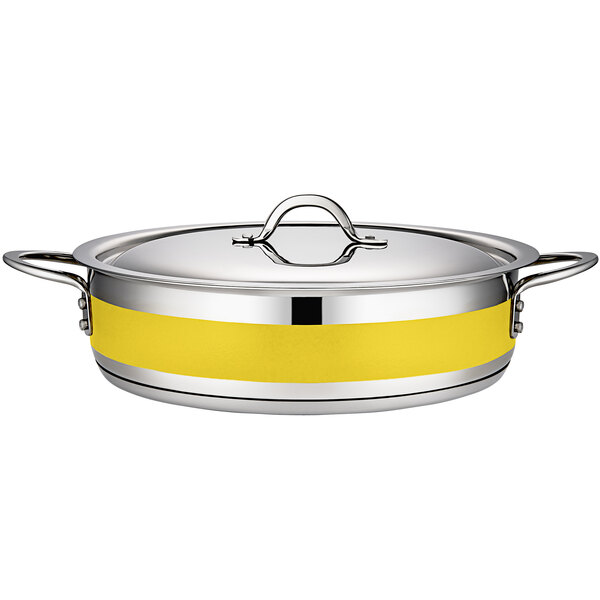 A yellow stainless steel Bon Chef brazier pot with lid.