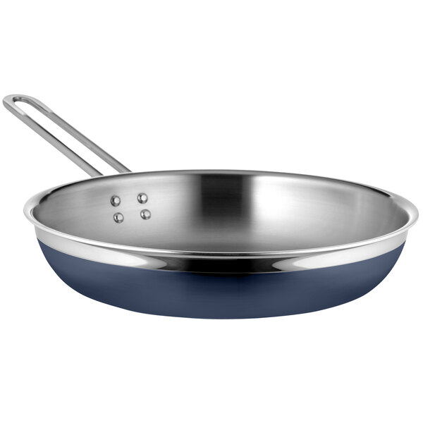 A close-up of a Bon Chef cobalt blue and silver stainless steel saute pan with a long handle.