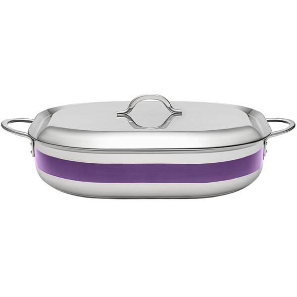 A silver stainless steel Bon Chef French oven with a purple lid.