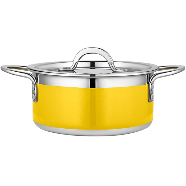 A yellow Bon Chef Country French stainless steel pot with a lid.