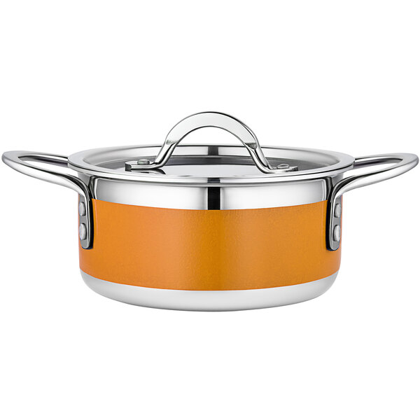 A Bon Chef stainless steel pot with an orange lid.