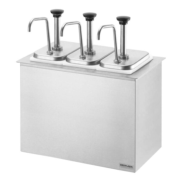 A stainless steel server with 3 metal containers and pumps on a counter.