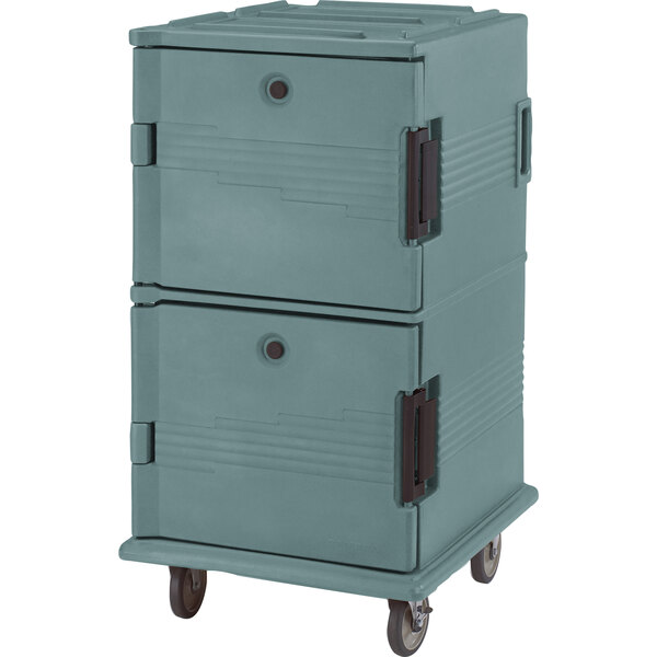 A close-up of a Cambro Slate Blue Ultra Camcart food pan carrier.