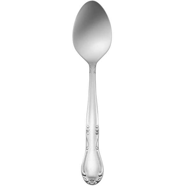 A Delco Melinda III stainless steel teaspoon with a handle.