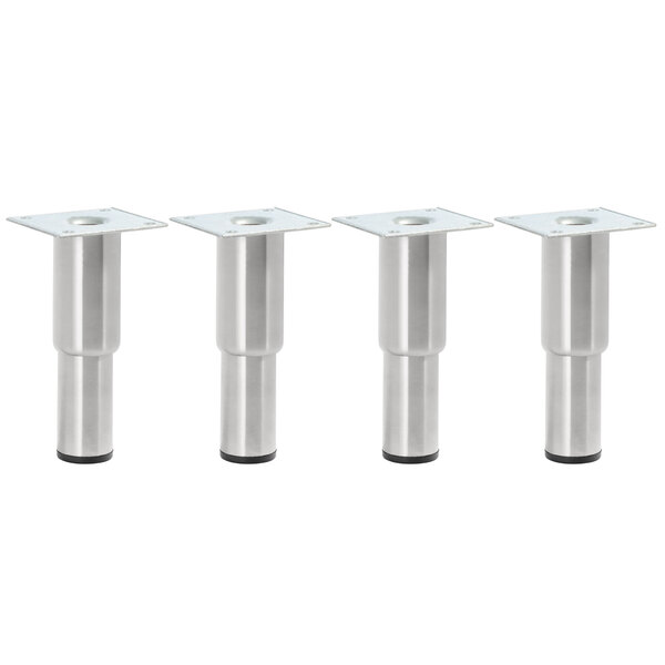 Three stainless steel legs with a silver cylindrical object.