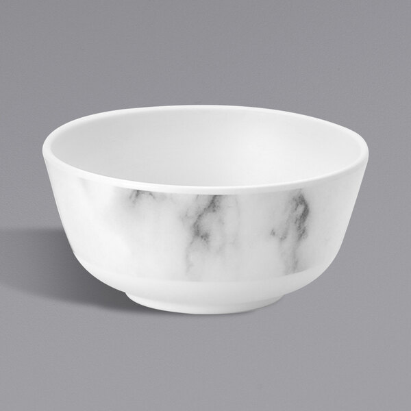 A white bowl with black marble pattern.