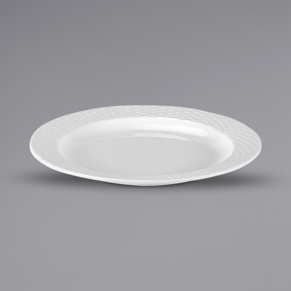 A white Bon Chef melamine dinner plate with a pattern.