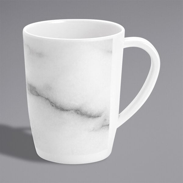 A white mug with a marble pattern.