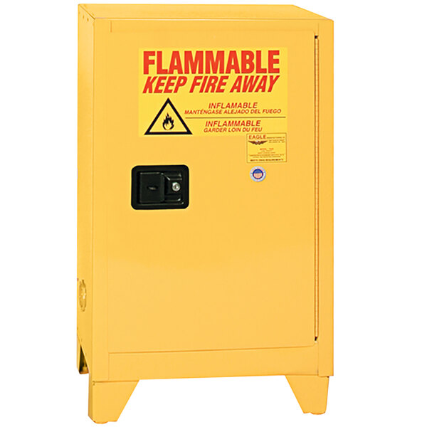A yellow Eagle Manufacturing safety cabinet with the word "Flammable" on it.
