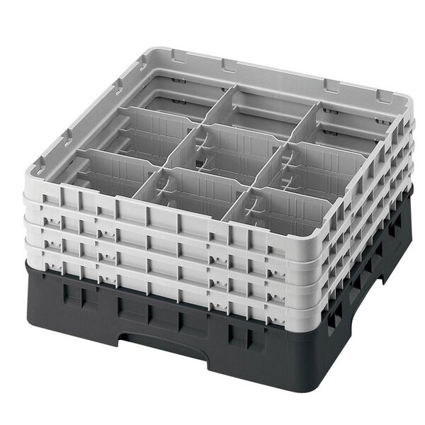 A black plastic Cambro glass rack with 9 compartments and 5 extenders.
