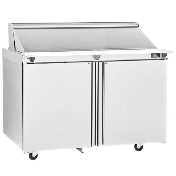 A stainless steel Delfield refrigerator with 4 drawers.