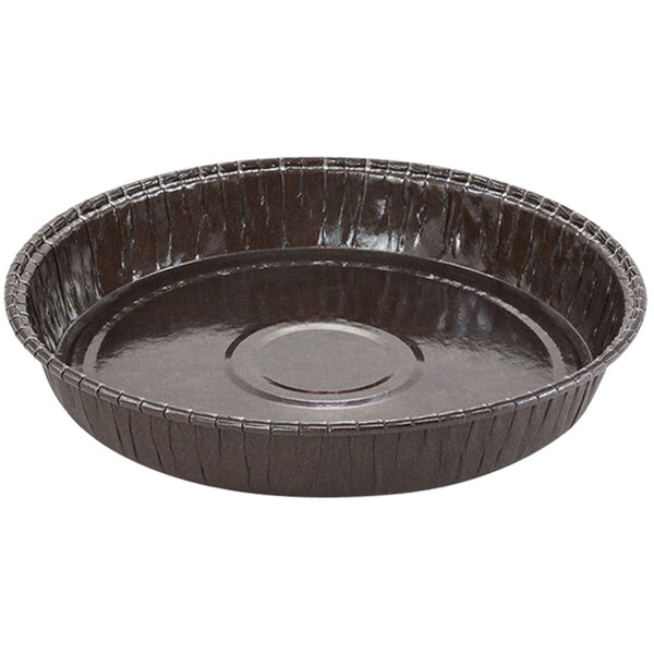 A round brown paper baking mold with a round bottom.