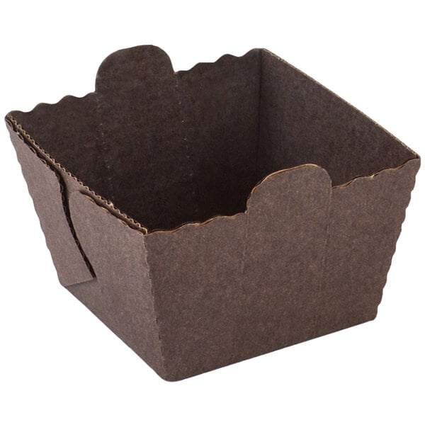 A brown cardboard Novacart cube mold.