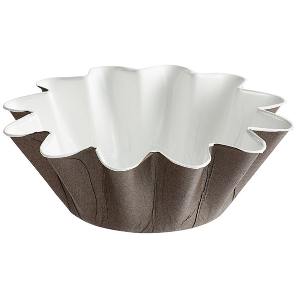 A brown and white Novacart baking cup with a flower design.
