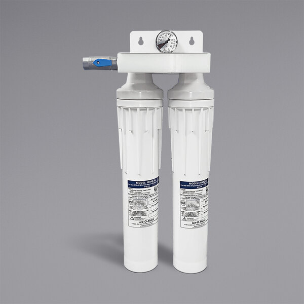 An Ice-O-Matic water filtration system with two blue and white water filters.