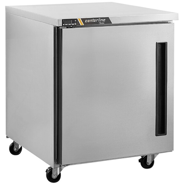 A stainless steel Traulsen undercounter refrigerator with a right hinged door on wheels.