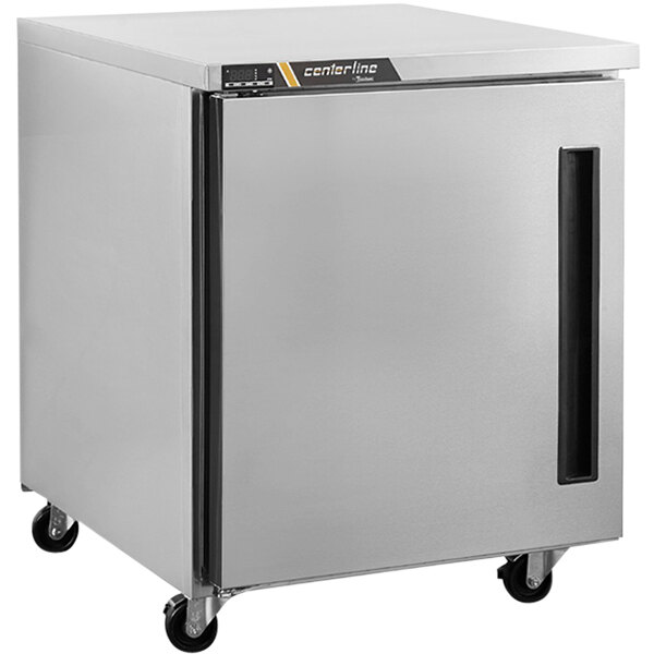 A silver Traulsen undercounter freezer with a right hinged door.