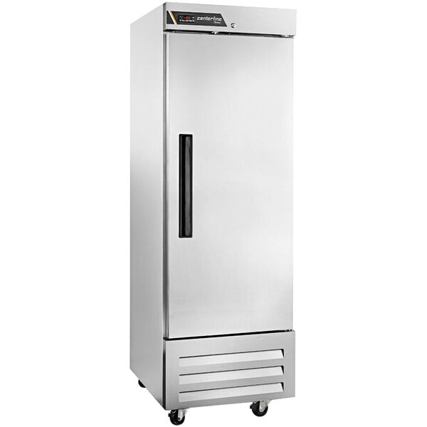 A Traulsen stainless steel reach-in freezer with a black handle on the door.