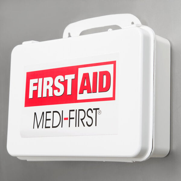 A white Medique first aid kit.