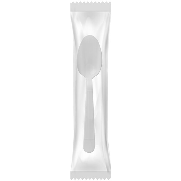 An individually wrapped white plastic spoon.