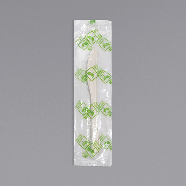 A Fineline Conserveware individually wrapped white PSM knife in a plastic bag.