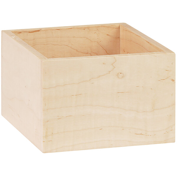A Cal-Mil maple wood box with a lid and a hole.