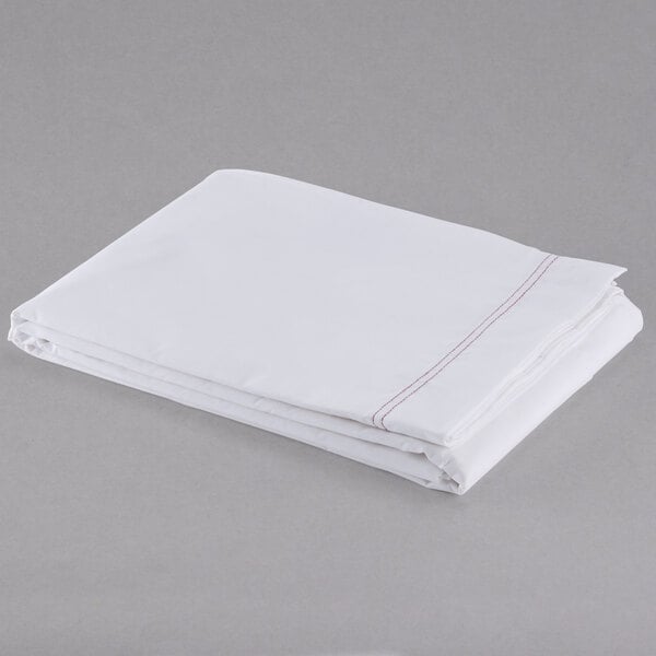 A folded white Oxford T180 Superblend flat sheet.