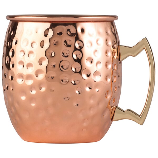 An Arcoroc copper mule mug with a handle.