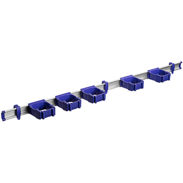 A white Toolflex tool rack with purple tool holders.