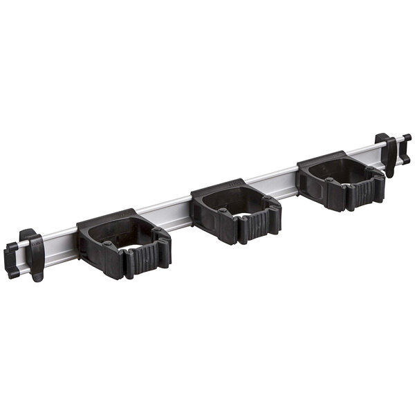 A white metal Toolflex rack with black plastic holders.