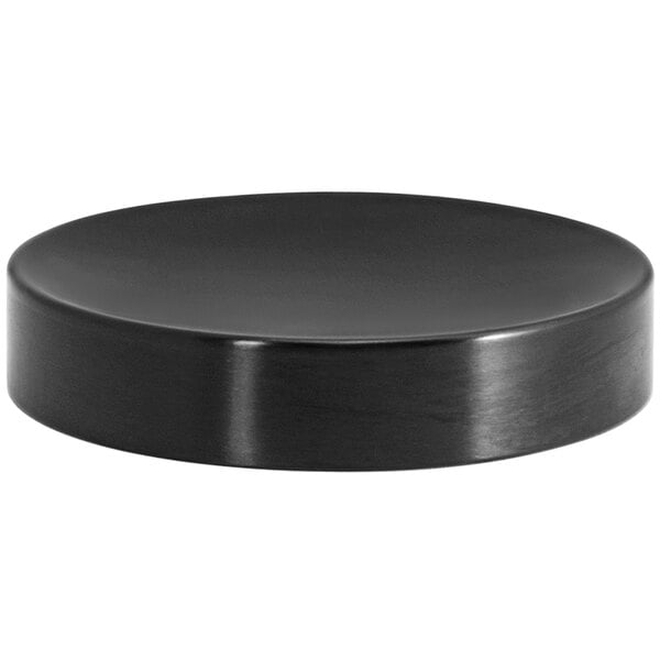 A Room360 matte black brushed stainless steel round plate with a black rim.