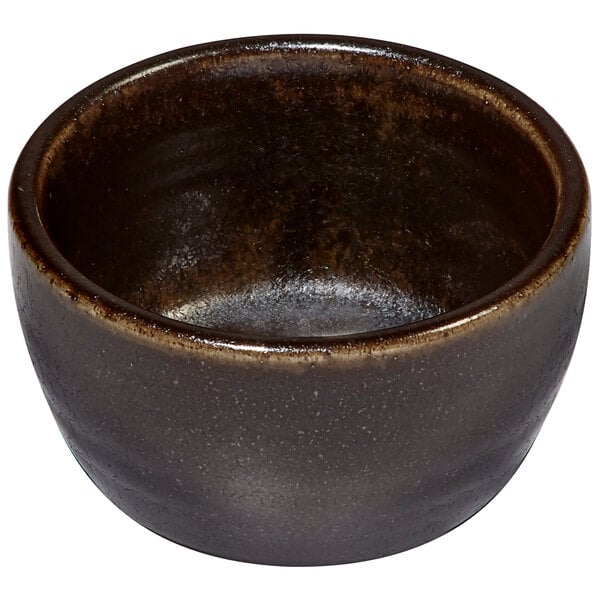 A brown bowl with a black rim.