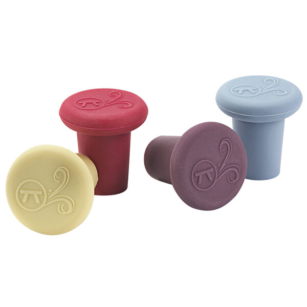 Three different colored silicone wine stoppers with a white circle and a design on it.