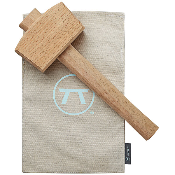 An Outset wood ice mallet with a Lewis cloth bag on it.