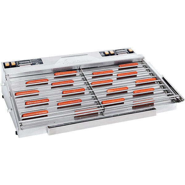 A Cretors hot dog grill with orange and white strips on it.